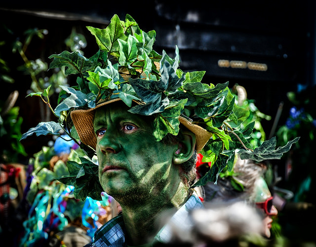 A man dressed as a plant at a Hastings festival