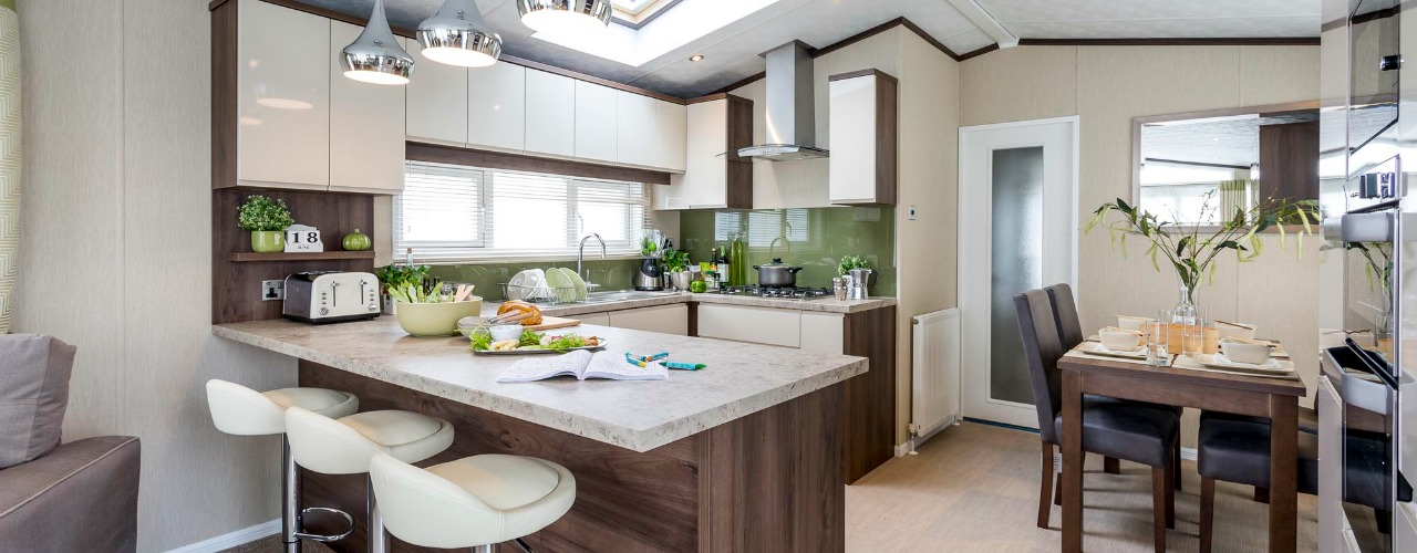 Kitchen in the newer model platinum caravan with decking