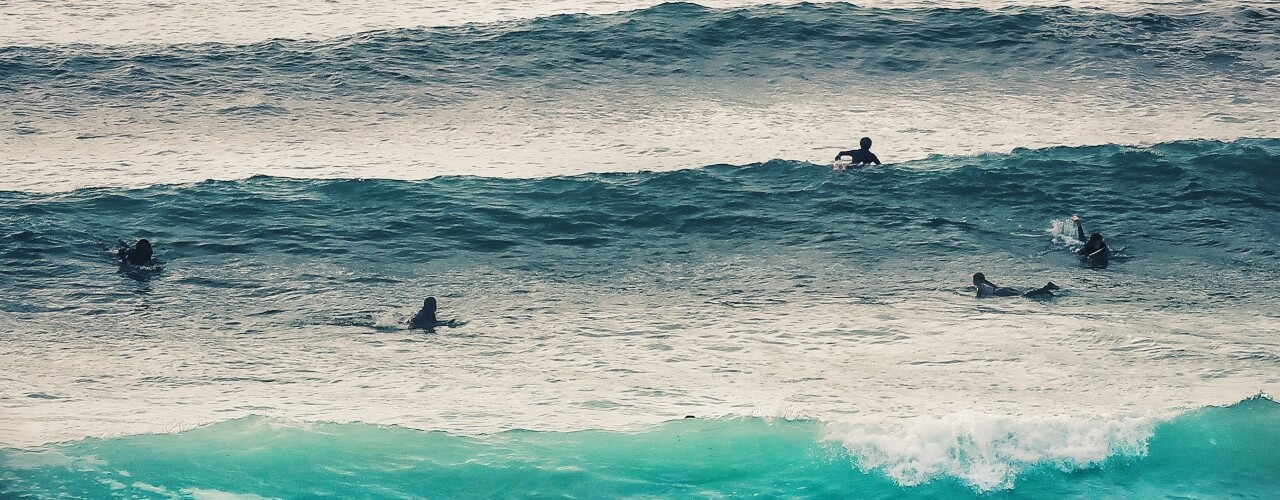 Surfers on the UK coast