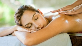 women being given a massage in a spa