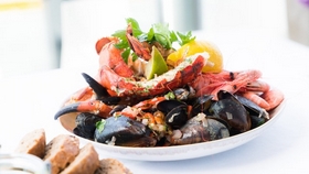 delicious seafood meal with prawns, mussels and lemon