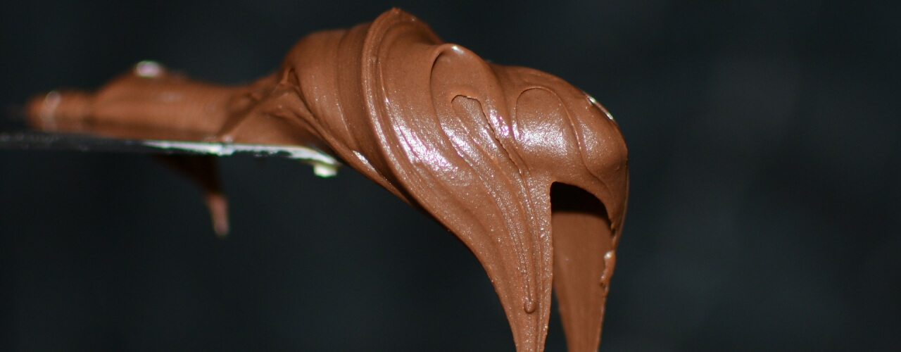 Melted chocolate on a spoon