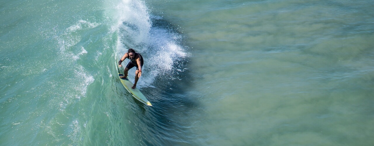 Surfer at Cayton Bay in Yorkshire