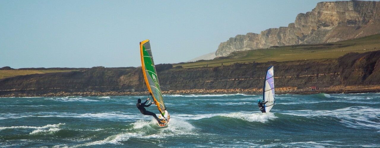 Windsurfers at Kimmeridge Bay in Dorset