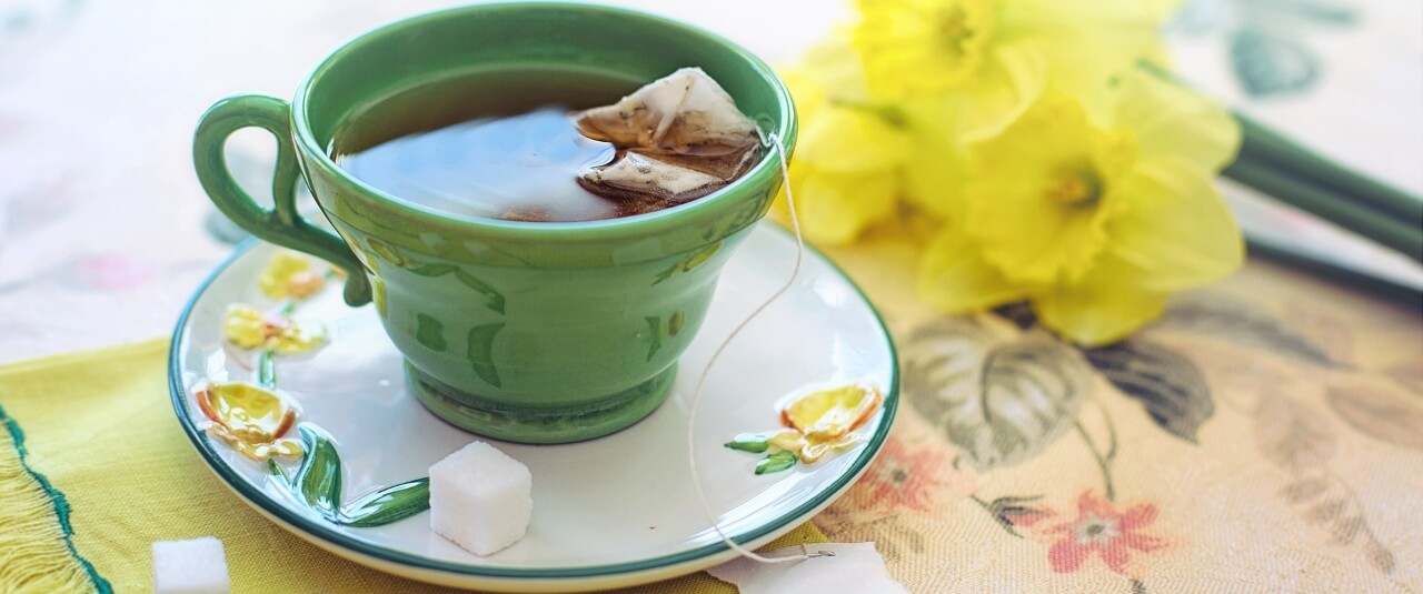 A cup of tea with a teabag in it